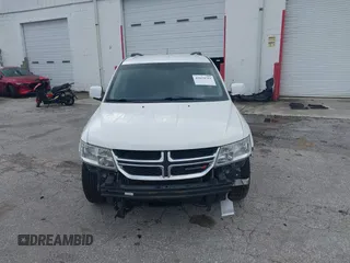 2012 Dodge Journey SXT with VIN 3C4PDCBG3CT331693, listed as a IAAI auction lot 42624751 with 165,480 mi miles and . Bid and sale history available at DreamBid. Image 13.