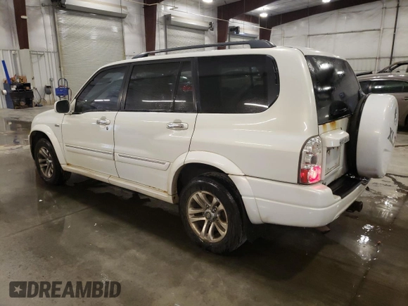 2004 Suzuki XL7 LX with VIN JS3TX92V044106650, listed as a Copart auction lot 76285514 with 185,356 mi miles and Salvage title. Bid and sale history available at DreamBid. Image 2.