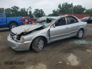 2005 Kia Optima LX z VIN KNAGD126455430602, wystawiony jako Copart lot #61131015 z przebiegiem Nie podano mil oraz Szkoda całkowita • Salvage title. Historia ofert i sprzedaży dostępna na DreamBid. Obrazek 1.