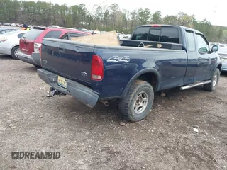 2003 Ford F-150 XL with VIN 1FTRX18L63NB59927, listed as a IAAI auction lot 41842559 with 1 mi miles. Bid and sale history available at carsss.com. Image 4.