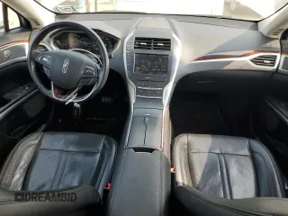 2015 Lincoln MKZ z VIN 3LN6L2GK9FR622783, wystawiony jako Copart lot #59892995 z przebiegiem 174 209 mil mil oraz Szkoda całkowita • Salvage title. Historia ofert i sprzedaży dostępna na DreamBid. Obrazek 8.