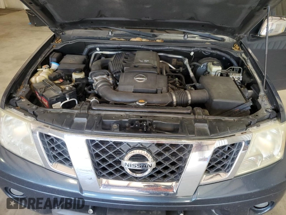 2014 Nissan Frontier SV with VIN 1N6AD0ER1EN770604, listed as a Copart auction lot 52885885 with 130,971 mi miles and Salvage Title. Bid and sale history available at DreamBid. Image 11.