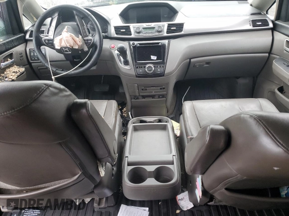 2014 Honda Odyssey Touring with VIN 5FNRL5H95EB056118, listed as a Copart auction lot 57729865 with Not provided miles and Salvage title. Bid and sale history available at DreamBid. Image 8.