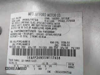 2005 Ford Focus S with VIN 1FAFP34N55W117628, listed as a IAAI auction lot 41882291 with 220,001 mi miles. Bid and sale history available at carsss.com. Image 9.