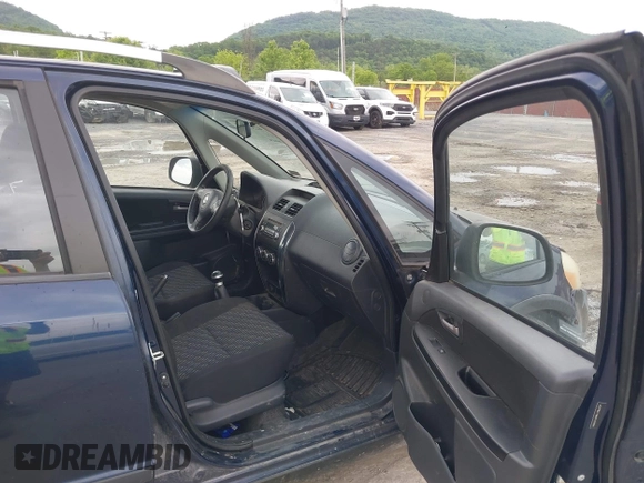 2008 Suzuki SX4 z VIN JS2YB417885103056, wystawiony jako IAAI lot #42359745 z przebiegiem 202 638 mil mil oraz . Historia ofert i sprzedaży dostępna na DreamBid. Obrazek 5.