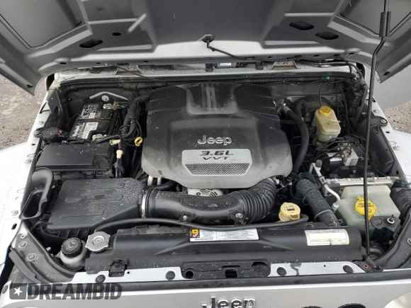 2012 Jeep Wrangler Arctic with VIN 1C4AJWBG4CL131823, listed as a Copart auction lot 87161194 with 152,124 mi miles and Clean title. Bid and sale history available at DreamBid. Image 11.