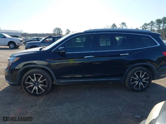 2019 Honda Pilot Touring 8-Passenger with VIN 5FNYF5H94KB029572, listed as a IAAI auction lot 41729215 with 149,799 mi miles. Bid and sale history available at carsss.com. Image 14.