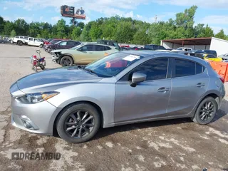 2015 Mazda 3 i Touring with VIN 3MZBM1L73FM151591, listed as a IAAI auction lot 42586506 with 125,573 mi miles and . Bid and sale history available at DreamBid. Image 14.