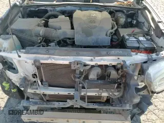2017 Toyota Tacoma SR5 with VIN 3TMBZ5DN3HM006742, listed as a Copart auction lot 65703475 with 125,180 mi miles and Salvage title. Bid and sale history available at DreamBid. Image 13.