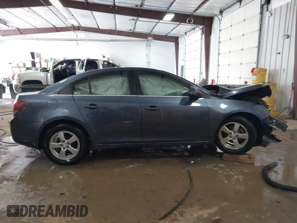 2014 Chevrolet Cruze 1LT with VIN 1G1PC5SB0E7112323, listed as a IAAI auction lot 41571759 with 191,477 mi miles and . Bid and sale history available at DreamBid. Image 14.