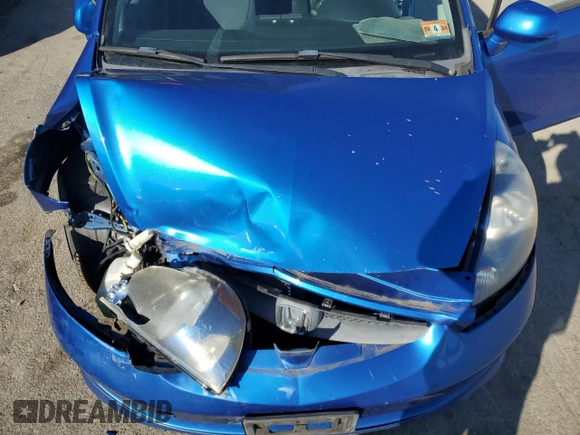 2007 Honda Fit Sport z VIN JHMGD37657S041378, wystawiony jako Copart lot #52042925 z przebiegiem 207 258 mil mil oraz Szkoda całkowita • Salvage title. Historia ofert i sprzedaży dostępna na DreamBid. Obrazek 11.