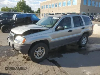 2003 Jeep Grand Cherokee with VIN 1J8GW48N13C518408, listed as a Copart auction lot 73358594 with 199,636 mi miles and Salvage title. Bid and sale history available at DreamBid. Image 1.
