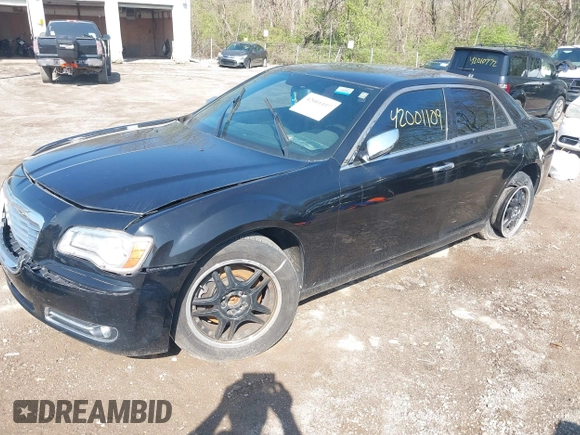 2014 Chrysler 300 C with VIN 2C3CCAKG5EH179583, listed as a IAAI auction lot 42001109 with 148,288 mi miles and . Bid and sale history available at carsss.com. Image 2.