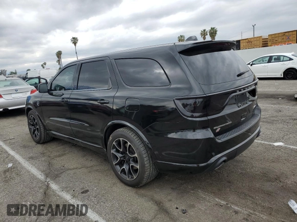 2021 Dodge Durango SRT Hellcat with VIN 1C4SDJH93MC626586, listed as a Copart auction lot 50986195 with 55,495 mi miles and Salvage Title. Bid and sale history available at DreamBid. Image 2.