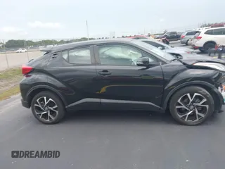 2021 Toyota C-HR LE z VIN NMTKHMBX3MR127202, wystawiony jako IAAI lot #42188312 z przebiegiem 54 029 mil mil oraz . Historia ofert i sprzedaży dostępna na DreamBid. Obrazek 14.