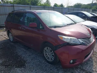 2014 Toyota Sienna XLE with VIN 5TDYK3DC1ES465975, listed as a IAAI auction lot 42600282 with 237,805 mi miles and . Bid and sale history available at DreamBid. Image 1.
