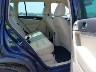 2012 Volkswagen Tiguan SEL with VIN WVGAV7AX8CW536752, listed as a IAAI auction lot 41798619 with 128,223 mi miles and . Bid and sale history available at DreamBid. Image 8.