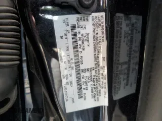 2013 Ford Focus SE z VIN 1FADP3F28DL292238, wystawiony jako Copart lot #51016715 z przebiegiem 165 699 mil mil oraz Szkoda całkowita • Salvage title. Historia ofert i sprzedaży dostępna na DreamBid. Obrazek 12.