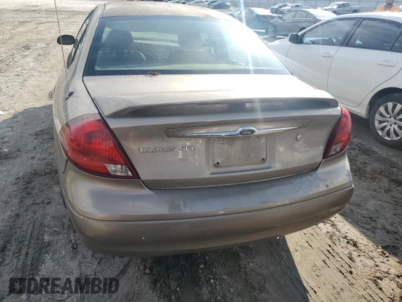 2003 Ford Taurus SEL Deluxe with VIN 1FAHP56SX3A243775, listed as a Copart auction lot 72245394 with 251,041 mi miles and Salvage Title. Bid and sale history available at DreamBid. Image 6.