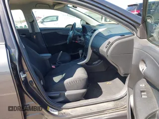 2009 Toyota Corolla with VIN 1NXBU40E69Z034459, listed as a IAAI auction lot 42095649 with 173,296 mi miles. Bid and sale history available at carsss.com. Image 5.