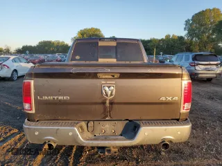 2014 Ram 1500 Longhorn with VIN 1C6RR7PMXES370857, listed as a Copart auction lot 69699954 with 105,590 mi miles and Salvage title. Bid and sale history available at DreamBid. Image 6.
