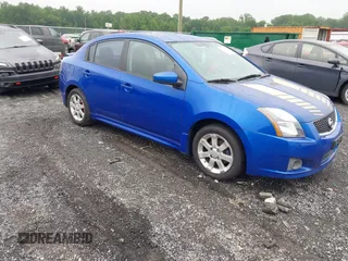 2012 Nissan Sentra S z VIN 3N1AB6AP1CL636403, wystawiony jako IAAI lot #42523656 z przebiegiem 126 036 mil mil oraz . Historia ofert i sprzedaży dostępna na DreamBid. Obrazek 1.