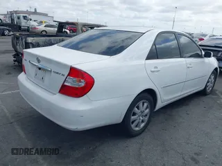 2003 Toyota Camry LE with VIN JTDBE32K530180834, listed as a IAAI auction lot 42255688 with 134,594 mi miles and . Bid and sale history available at DreamBid. Image 4.
