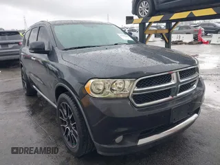 2013 Dodge Durango Crew with VIN 1C4RDJDG3DC675676, listed as a IAAI auction lot 41765289 with 140,626 mi miles. Bid and sale history available at carsss.com. Image 1.