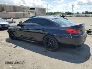2015 BMW M6 z VIN WBS6C9C50FD467779, wystawiony jako Copart lot #56702794 z przebiegiem 78 259 mil mil oraz Szkody całkowita. Historia ofert i sprzedaży dostępna na DreamBid. Obrazek 2.