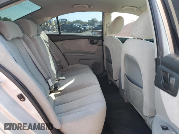 2010 Kia Optima LX z VIN KNAGG4A85A5407416, wystawiony jako Copart lot #71970634 z przebiegiem 194 869 mil mil oraz Szkoda całkowita • Salvage title. Historia ofert i sprzedaży dostępna na DreamBid. Obrazek 10.
