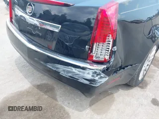 2011 Cadillac CTS Luxury with VIN 1G6DF5EY8B0100736, listed as a IAAI auction lot 42581059 with 107,237 mi miles and . Bid and sale history available at DreamBid. Image 15.