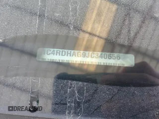 2018 Dodge Durango SXT z VIN 1C4RDHAG9JC340656, wystawiony jako Copart lot #54989615 z przebiegiem Nie podano mil oraz Szkoda całkowita • Salvage title. Historia ofert i sprzedaży dostępna na DreamBid. Obrazek 13.