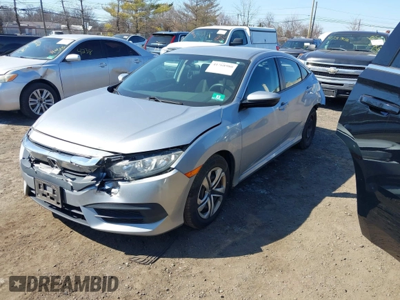 2016 Honda Civic LX with VIN 19XFC2F5XGE230467, listed as a IAAI auction lot 41768980 with 145,592 mi miles. Bid and sale history available at carsss.com. Image 2.
