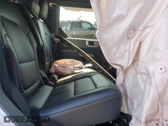 2023 Ford Bronco с VIN 1FMEE5DPXPLB63867, выставлен на аукционе Copart как лот 53782605 с пробегом 46 858 миль миль и Списание • Salvage title. История ставок и продаж доступна на DreamBid. Изображение 10.