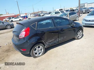 2015 Ford Fiesta SE with VIN 3FADP4EJXFM190262, listed as a IAAI auction lot 41997760 with 81,522 mi miles. Bid and sale history available at carsss.com. Image 4.