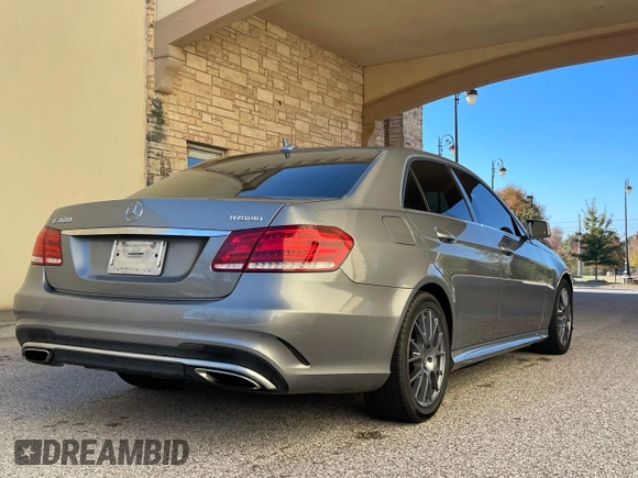 2014 Mercedes-Benz E 400 Sport with VIN WDDHF9FB9EA824262, listed as a Copart auction lot 83266854 with 135,889 mi miles and Clean Title. Bid and sale history available at DreamBid. Image 4.