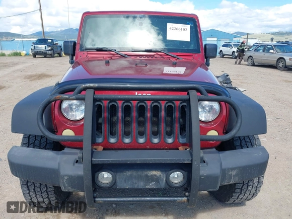 2012 Jeep Wrangler Unlimited Sport z VIN 1C4BJWDG8CL258625, wystawiony jako IAAI lot #42266102 z przebiegiem 58 594 mil mil oraz . Historia ofert i sprzedaży dostępna na DreamBid. Obrazek 13.