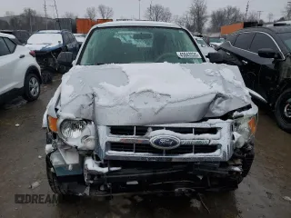 2010 Ford Escape XLS с VIN 1FMCU0C77AKD47899, выставлен на аукционе Copart как лот 45043535 с пробегом Не указан миль и Списание • Salvage title. История ставок и продаж доступна на DreamBid. Изображение 5.