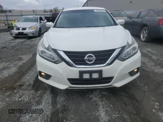 2018 Nissan Altima SR with VIN 1N4AL3AP0JC206823, listed as a Copart auction lot 79438124 with 119,356 mi miles and Salvage Title. Bid and sale history available at carsss.com. Image 5.