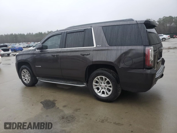 2015 GMC Yukon SLT with VIN 1GKS1BKC9FR278056, listed as a Copart auction lot 44989505 with 205,885 mi miles and Salvage Title. Bid and sale history available at carsss.com. Image 2.