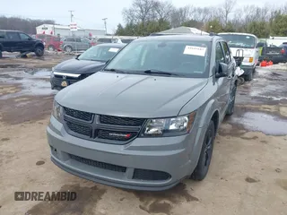 2020 Dodge Journey SE Value with VIN 3C4PDCAB7LT201714, listed as a IAAI auction lot 41643187 with 89,841 mi miles and . Bid and sale history available at carsss.com. Image 2.