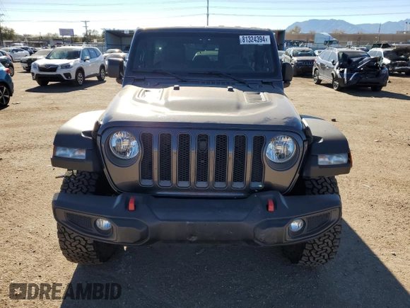 2023 Jeep Wrangler Rubicon with VIN 1C4HJXFN6PW509741, listed as a Copart auction lot 81324394 with 21,755 mi miles and Salvage title. Bid and sale history available at DreamBid. Image 5.