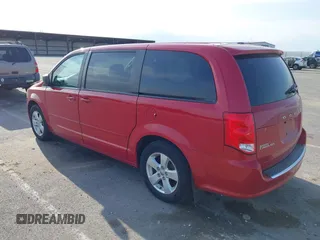 2013 Dodge Grand Caravan SE with VIN 2C4RDGBG9DR723999, listed as a IAAI auction lot 41993367 with 177,549 mi miles and . Bid and sale history available at DreamBid. Image 3.