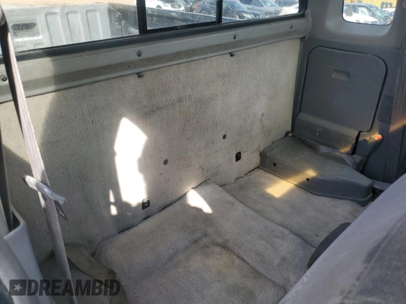 1999 Nissan Frontier XE with VIN 1N6DD26S6XC332458, listed as a Copart auction lot 48028715 with 182,706 mi miles and Salvage title. Bid and sale history available at DreamBid. Image 10.
