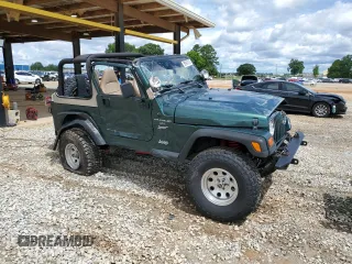 1999 Jeep Wrangler Sport with VIN 1J4FY19S0XP402688, listed as a Copart auction lot 58968125 with 211,910 mi miles and Salvage title. Bid and sale history available at DreamBid. Image 4.