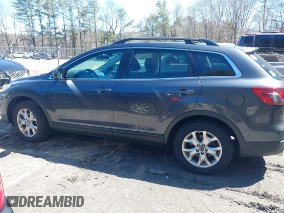 2015 Mazda CX-9 Touring with VIN JM3TB3CV1F0461854, listed as a IAAI auction lot 42068299 with 128,124 mi miles. Bid and sale history available at carsss.com. Image 14.