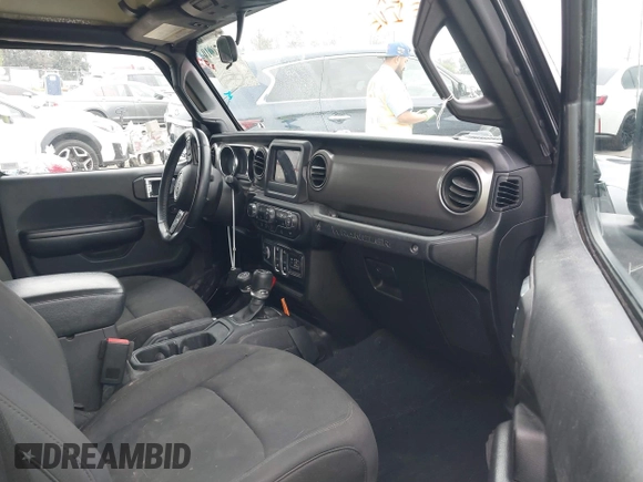2021 Jeep Wrangler Sport with VIN 1C4GJXAN5MW627228, listed as a IAAI auction lot 42170010 with 56,965 mi miles and . Bid and sale history available at DreamBid. Image 5.
