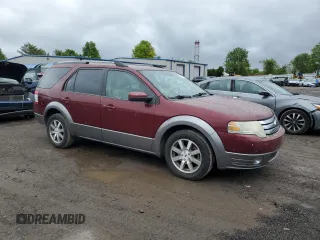 2008 Ford Taurus X SEL z VIN 1FMDK02W68GA43723, wystawiony jako Copart lot #56650305 z przebiegiem 279 439 mil mil oraz Czysty tytuł • Clean title. Historia ofert i sprzedaży dostępna na DreamBid. Obrazek 4.