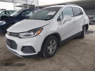 2020 Chevrolet Trax LT with VIN KL7CJLSBXLB010793, listed as a IAAI auction lot 41704879 with 124,915 mi miles and . Bid and sale history available at DreamBid. Image 2.