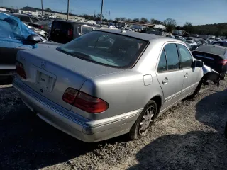 2001 Mercedes-Benz E-Class with VIN WDBJF65J11B294200, listed as a Copart auction lot 73831854 with 117,441 mi miles and Salvage Title. Bid and sale history available at carsss.com. Image 3.